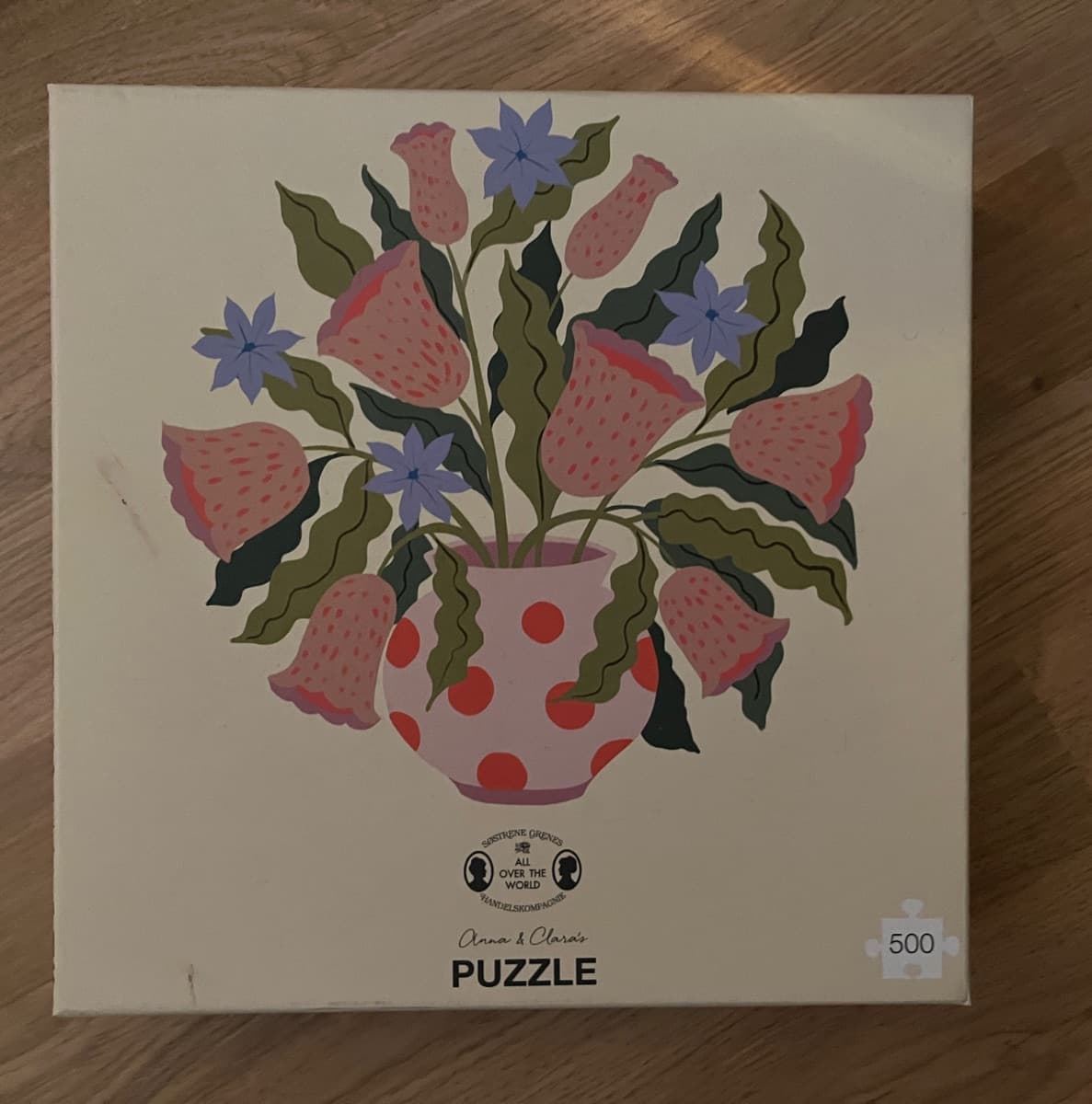 Blomsterbukett i prikket vase
